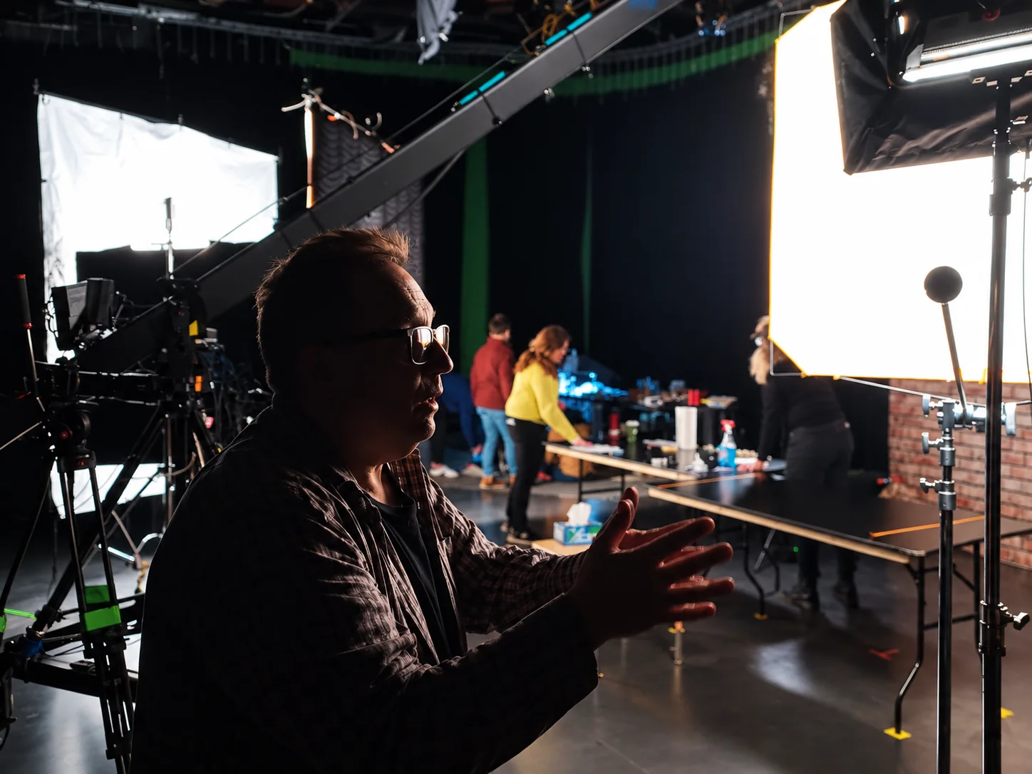 Professional video production crew and studio lighting during a video shoot in Albany, NY